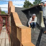 Restoration Team Repairing Roof and Architectural Details on Historic Portland Home