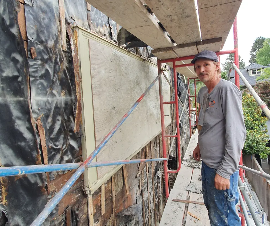 Restoration Team Repairing Roof and Architectural Details on Historic Portland Home