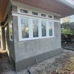 Finished historic stucco addition with matched pebbledash texture in Portland, Oregon
